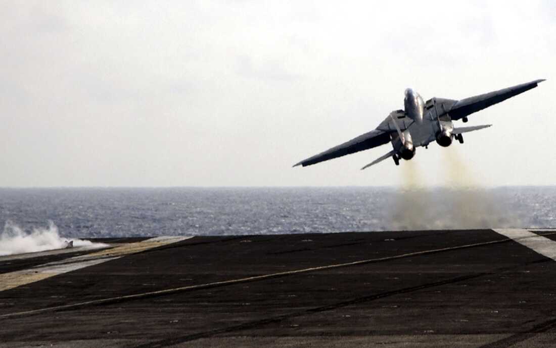 The final catapult launch of the F-14 Tomcat fighter aircraft aboard the USS Theodore Roosevelt on July 28, 2006. The U.S. military retired the plane that year.