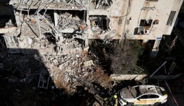 Iran targets Israel and Gulf Arab states even as Trump says U.S. is in talks to end war