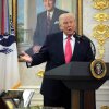 President Trump takes questions as Defense Secretary Pete Hegseth (left) looks on during a ceremony for Markwayne Mullin, the newly sworn-in secretary for the Department of Homeland Security, in the Oval Office at the White House in Washington, D.C., on Tuesday.