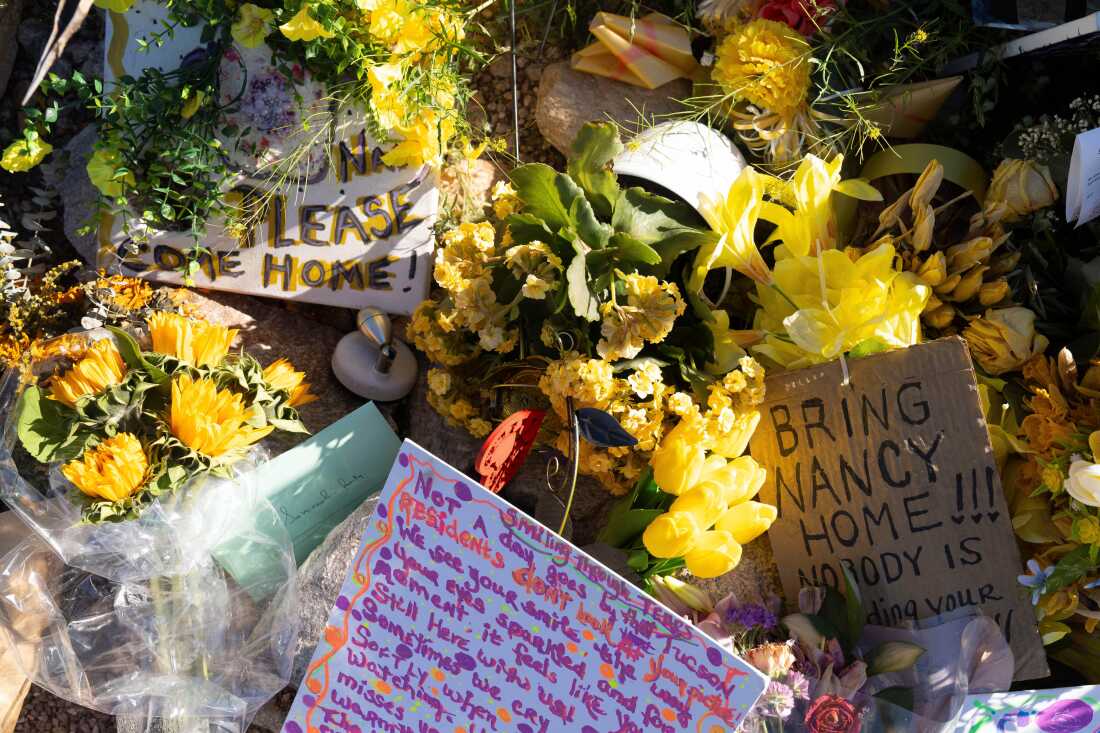 Yellow flowers and handwritten notes calling for the return of Nancy Guthrie sit outside the house of the 84-year-old mother of Today show co-host Savannah Guthrie, in Tucson, Ariz. Savannah Guthrie is speaking about her mother in an emotional two-part interview.