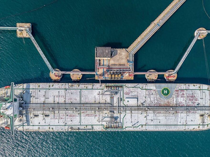 A oil tanker is docked unloading crude oil at the port in Qingdao, in China's eastern Shandong province, on March 25, 2026.