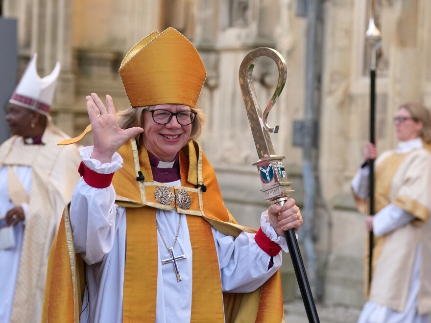 Sarah Mullally waves as she leaves after the Enthronement Ceremony installing her as archbishop of Canterbury in Canterbury, England, Wednesday, March 25, 2026, the first woman ever to lead the Church of England.