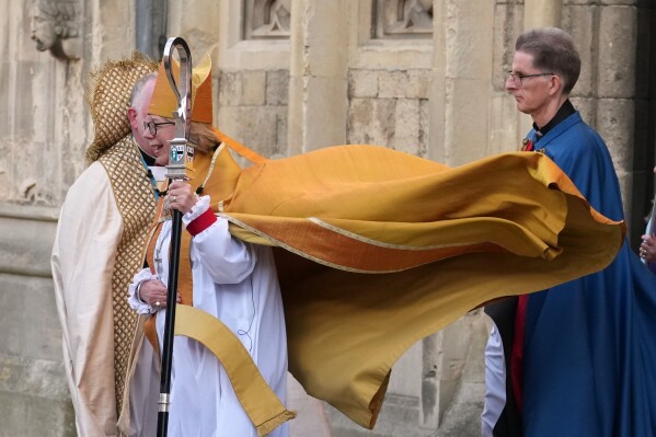Sarah Mullally leaves the Cathedral after the Enthronement Ceremony installing her as archbishop of Canterbury in Canterbury, England, Wednesday, March 25, 2026, the first woman ever to lead the Church of England. (AP Photo/Alastair Grant)