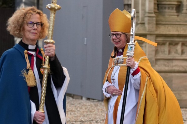 Sarah Mullally leaves the Cathedral after the Enthronement Ceremony installing her as archbishop of Canterbury in Canterbury, England, Wednesday, March 25, 2026, the first woman ever to lead the Church of England. (AP Photo/Alastair Grant)