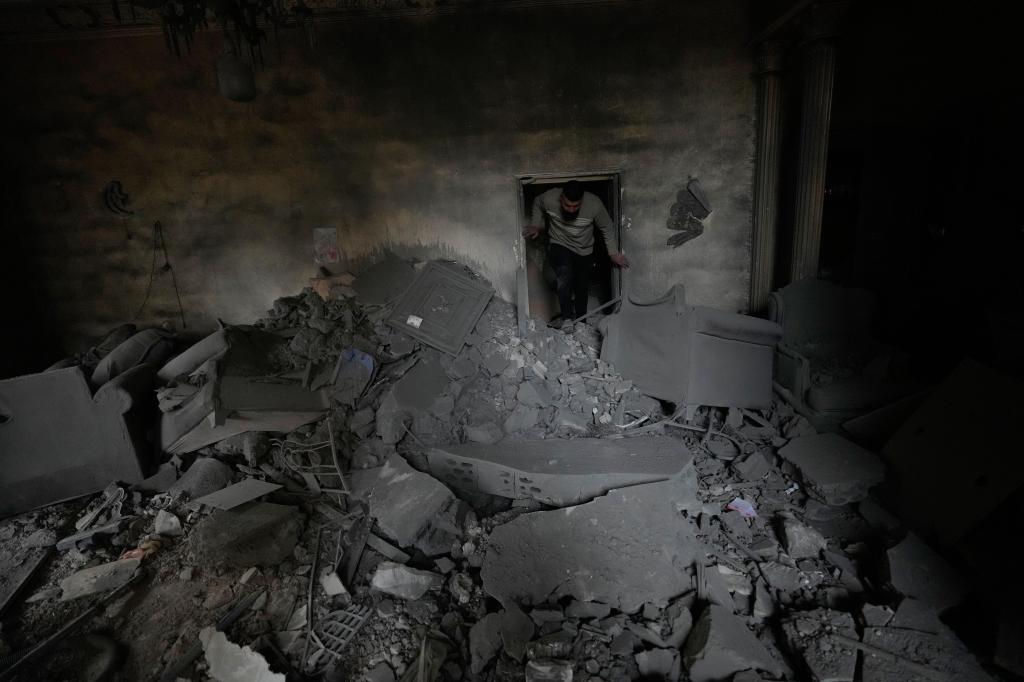 In southern Lebanese city emptied by Israel's offensive, some stay put