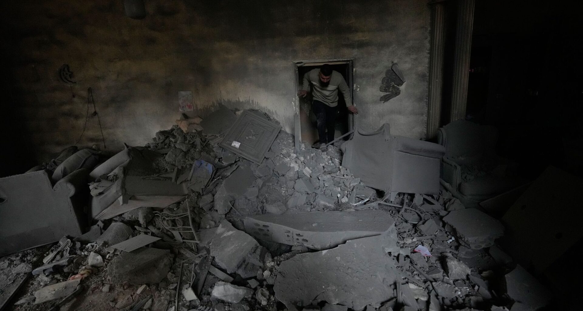 In a southern Lebanese city emptied by Israel's offensive, some vow to stay put