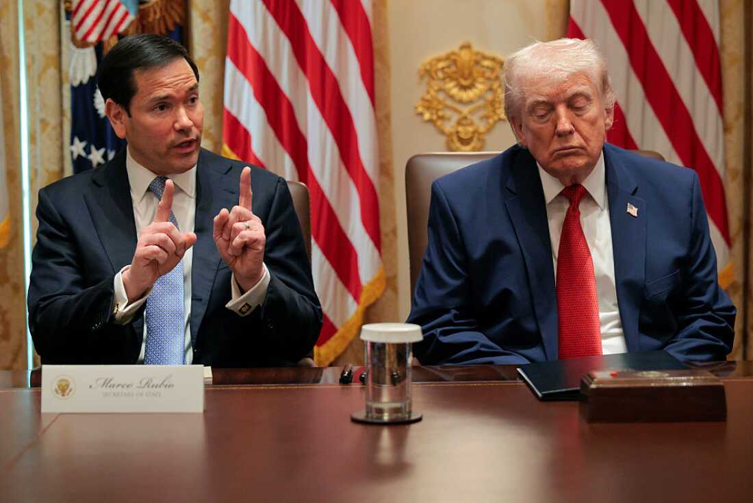 President Donald Trump listens as U.S. Secretary of State Marco Rubio (L) speaks during a Cabinet meeting in the Cabinet Room of the White House on March 26, 2026 in Washington, DC.