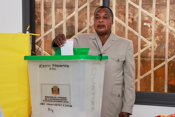 President of the Republic of Congo, Denis Sassou N'Guesso casts his ballot at a polling station in Brazzaville, the Republic of Congo, Sunday, March 15, 2026. (AP Photo/Vivace Mambouana)