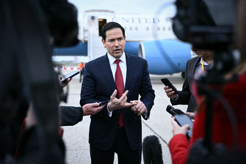 Secretary of State Marco Rubio gestures as he speaks to the press at the Bourget airport in Le Bourget, outside Paris, on March 27, following a G7 Foreign Ministers' meeting.