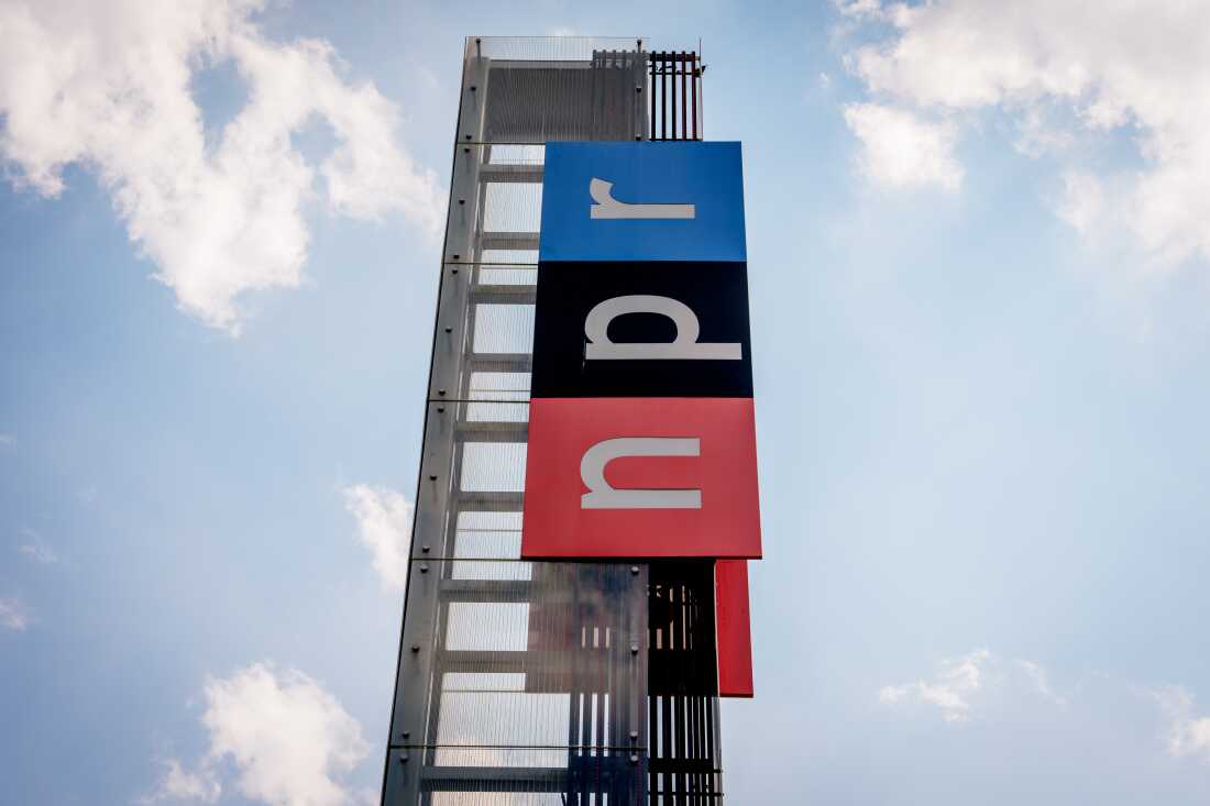 View of the sign outside National Public Radio headquarters on July 22, 2025 in Washington, DC.