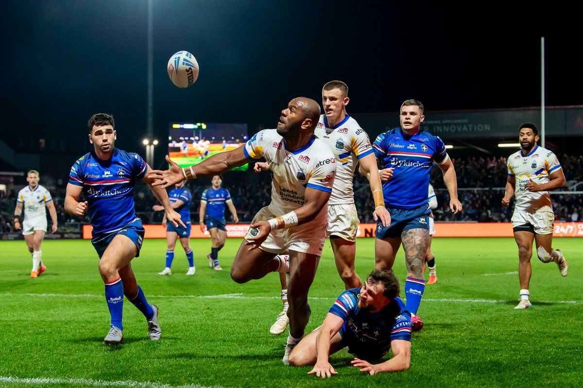 Leeds' Maika Sivo takes the loose ball to score his second try against Wakefield.