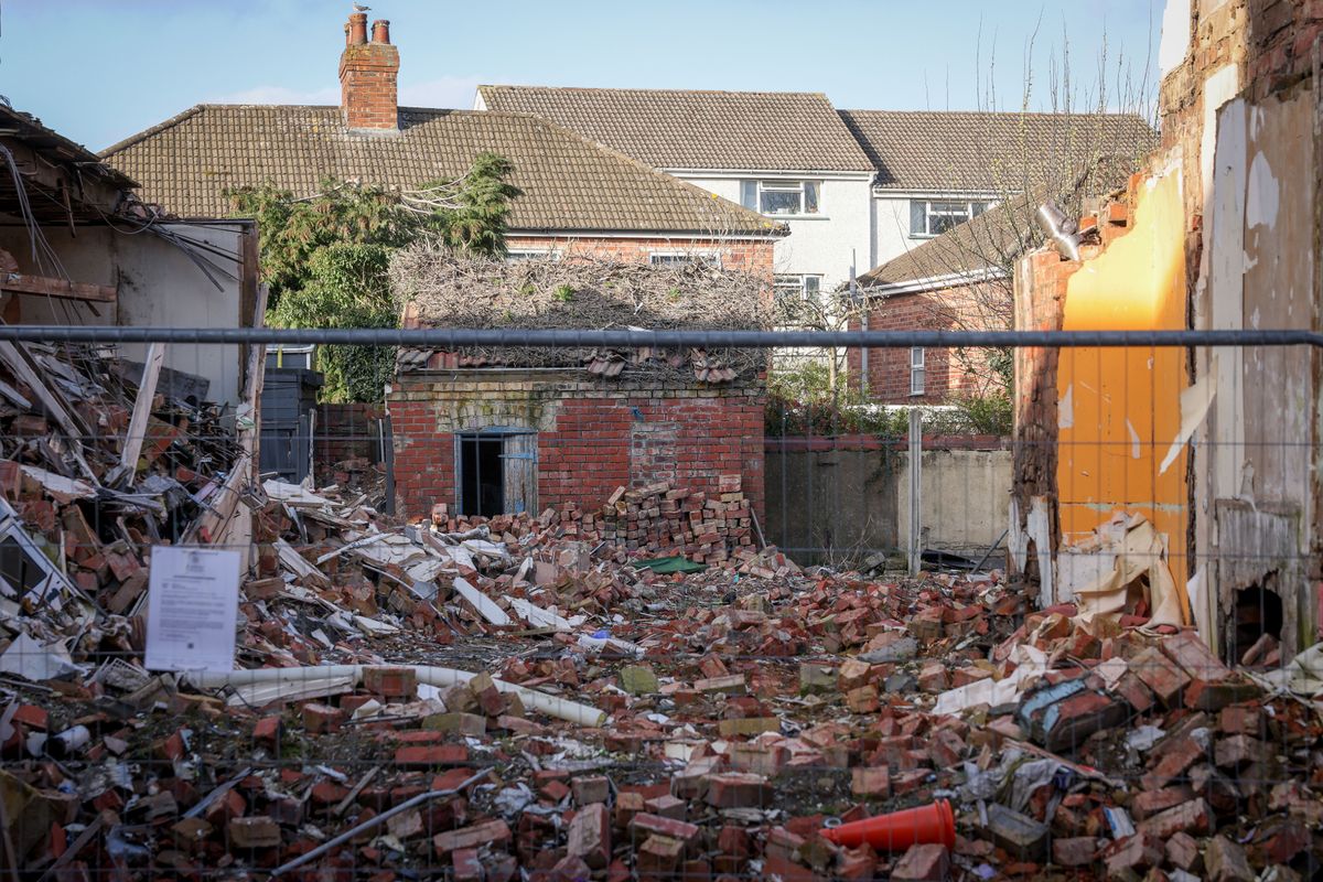 Photo shows the remains of the property in John Street, Worksop
