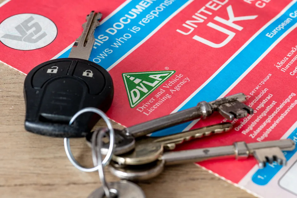 London. UK- 01.24.2025. Close up of a UK government V5C vehicle log book issued by the Drivers and Vehicle Licensing Agency.