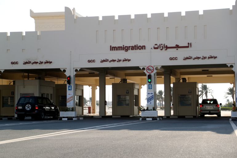 Cars move at Qatar's Abu Samra border crossing with Saudi Arabia. [Ibraheem Al Omari/REUTERS]