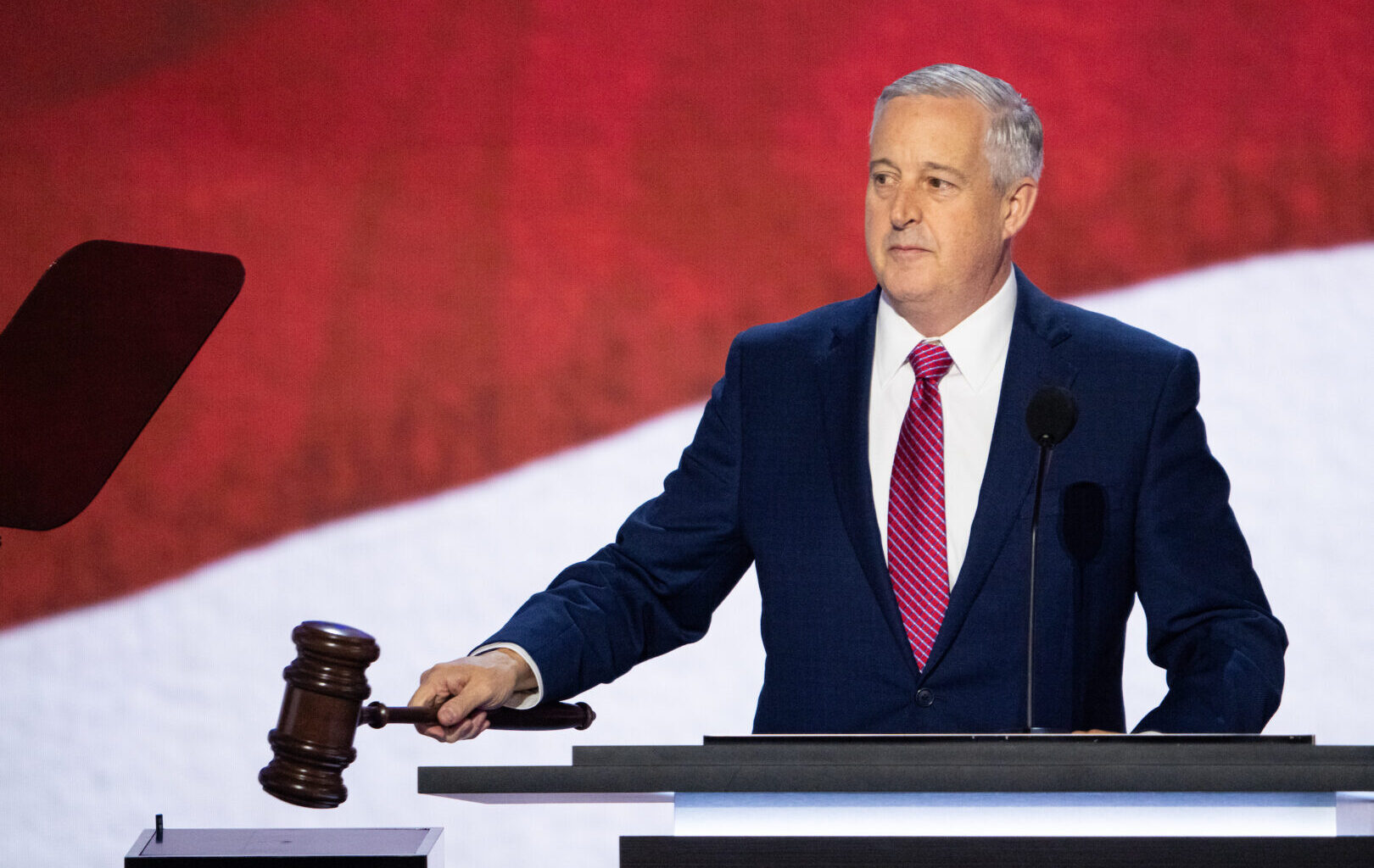 Then-Republican National Committee chairman Michael Whatley gavels the Republican National Convention to order at the Fiserv Forum in Milwaukee, Wisc., on Monday, July 15, 2024. Whatley faces former North Carolina Gov. Roy Cooper, a Democrat, in that state's open Senate race.