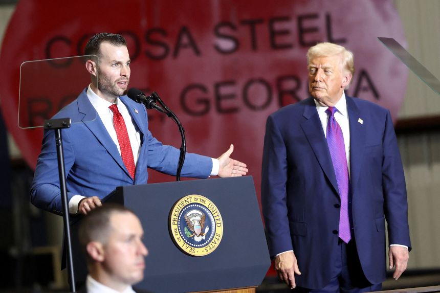 Clay Fuller speaks next to President Donald Trump in Rome, Georgia, on February 19, 2026.