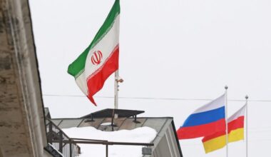 People bring flowers to the Iranian embassy in Moscow