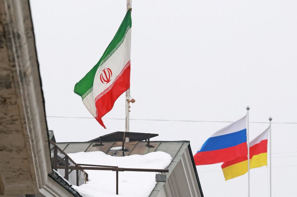 People bring flowers to the Iranian embassy in Moscow