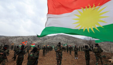FILE PHOTO: Iranian Kurdish fighters from the Kurdistan Freedom Party (PAK) take part in a training session at a base on t...