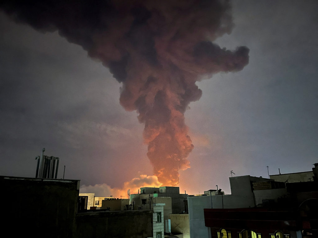 Smoke rises following an explosion, amid the U.S.-Israeli conflict with Iran, in Tehran
