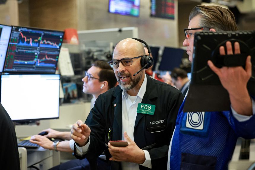 Futures-options traders work on the floor at the New York Stock Exchange's NYSE American (AMEX) in New York City, on March 9, 2026.