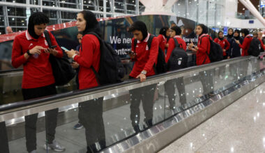 Members of the Iranian women's national soccer team arrive in Sepang