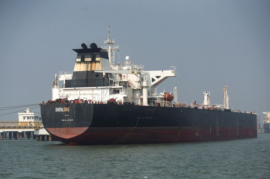 The Liberia-flagged tanker Shenlong Suezmax, loaded with Saudi Arabian crude, arrives at a port after transiting the Strait of Hormuz in Mumbai, India, on March 12, 2026.
