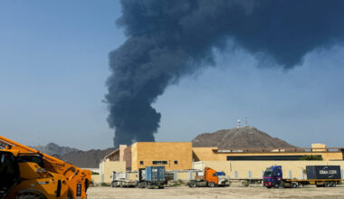 FILE PHOTO: Smoke rises in the Fujairah oil industry zone, caused by debris after interception of a drone by air defenses,...