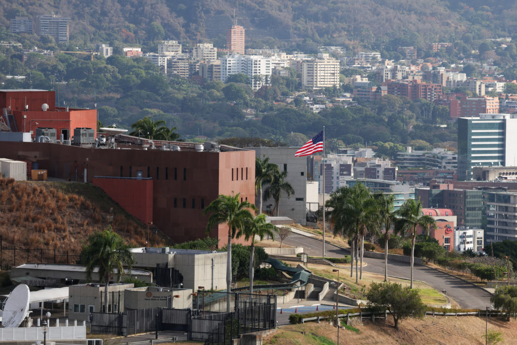 The U.S. flag hoisted at the Venezuela Affairs Unit as the U.S. and Venezuela re-establish diplomatic relations, in Caracas