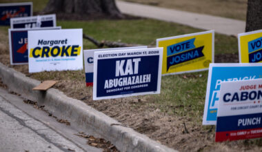 Kat Abughazaleh participates in a door knocking event while campaigning for the 2026 Illinois Primary Election