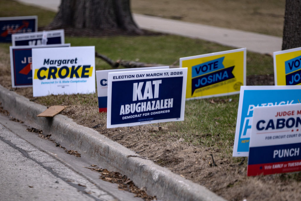 Kat Abughazaleh participates in a door knocking event while campaigning for the 2026 Illinois Primary Election