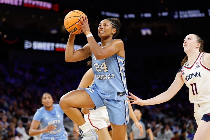 North Carolina Tar Heels guard Indya Nivar (24) drives to the basket ahead of UConn Huskies guard Allie Ziebell (11) during the second half at Dickies Arena in Fort Worth, Texas, on March 27.