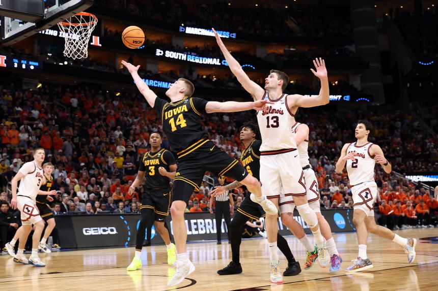 Iowa Hawkeyes guard Bennett Stirtz shoots a finger roll against Illinois in the Elite Eight of the men's 2026 NCAA Tournament.