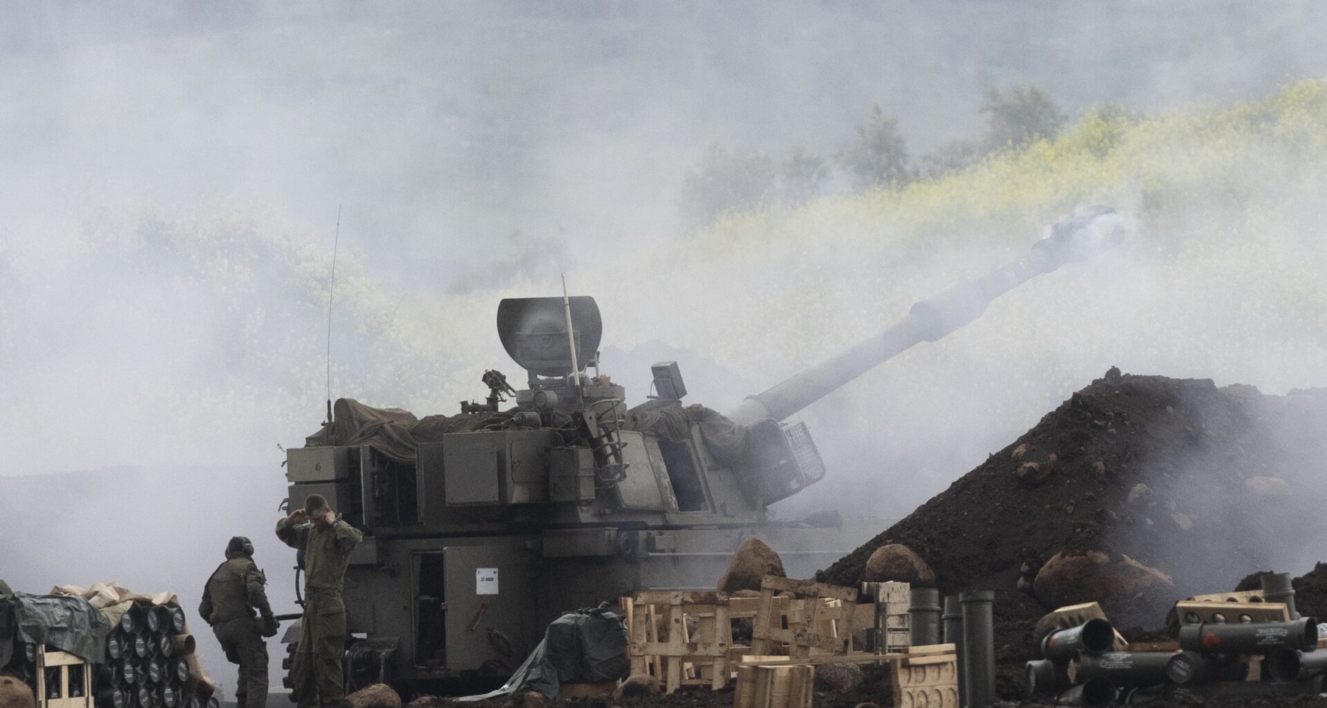 An Israeli artillery unit fires towards southern Lebanon as seen from a position on the Israeli side of the border on March 15, 2026.