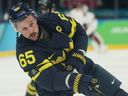 Erik Karlsson #65 of Team Sweden warms up prior to the Men's Qualification Playoff match between Sweden and Latvia on day 11 of the Milano Cortina 2026 Winter Olympic games at Milano Santagiulia Ice Hockey Arena on February 17, 2026 in Milan, Italy.