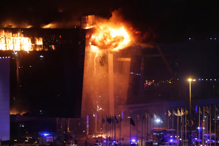 A fire rages inside the building