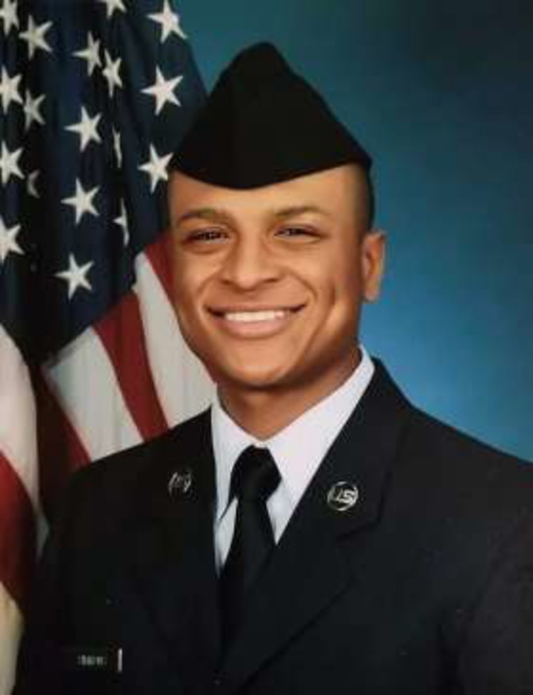 Tyler H. Simmons smiles in a portrait