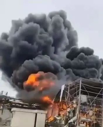 A FIRE resulting from an Iranian missile fragment in Ne