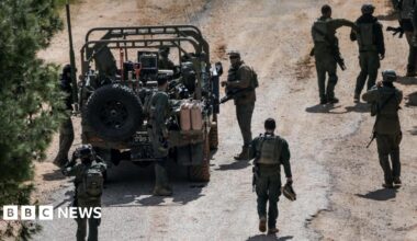 Israeli soldiers gather on the Israeli side of the border with Lebanon, in northern Israel (16 March 2026)