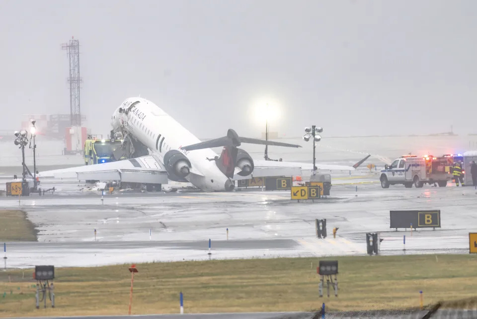 The Air Canada Express CRJ-900 sits on the runway at LaGuardia Airport on March 23, 2026.
