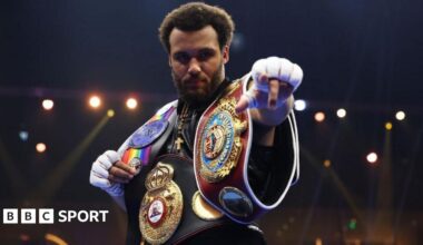 Derek Chisora and Deontay Wilder face off at a news conference draped in the flags of their country