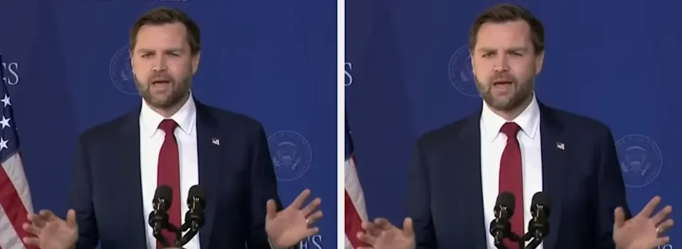 Man in a suit giving a speech at a podium with U.S. flags in the background