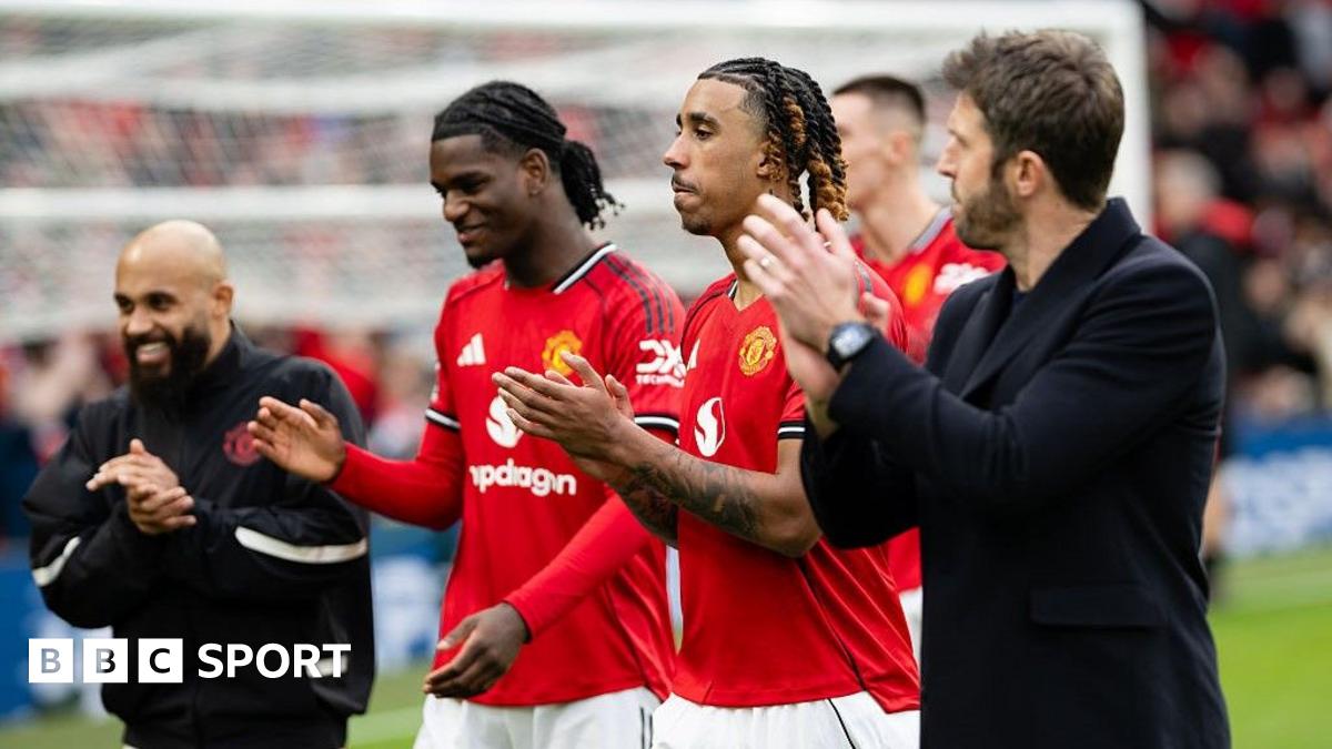 Manchester United head coach Michael Carrick (right), with Leny Yoro, Ayden Heaven and Bryan Mbeumo (left) after the 2-1 win against Crystal Palace