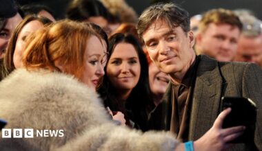 Cillian Murphy with a fan taking a selfie at the film's premiere in Birmingham