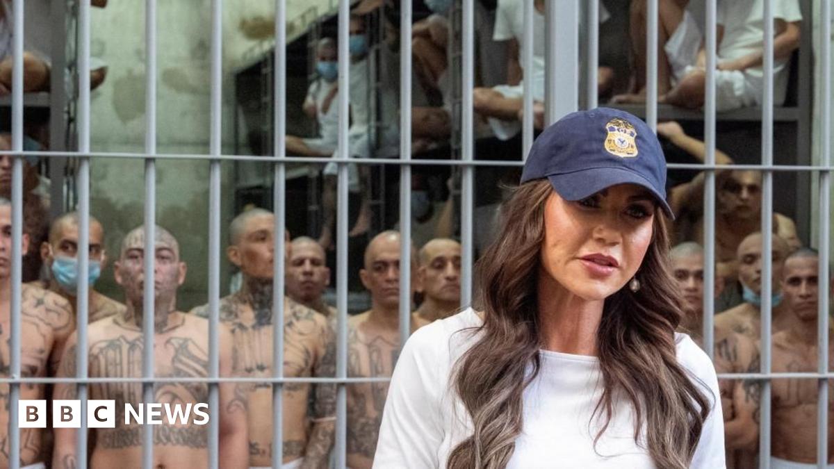 Noem visiting a maximum-security prison in El Salvador