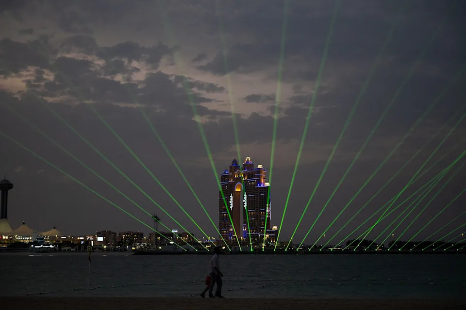 Ryan Lim/AFP via Getty Images - PHOTO: A man walks along the Corniche in Abu Dhabi, UAE, on March 20, 2026.