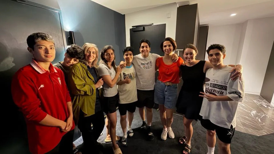 Seven members of the Iranian team who were granted asylum in Australia. - From Tony Burke, Australian home affairs minister