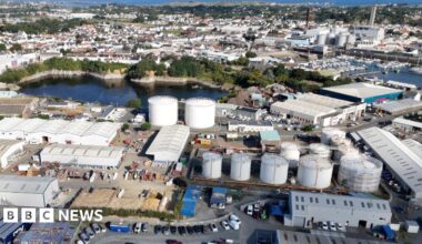 A drone's view of the Guernsey Gas gas holders. There are 11 large drums at the plant, which is close to a harbour.