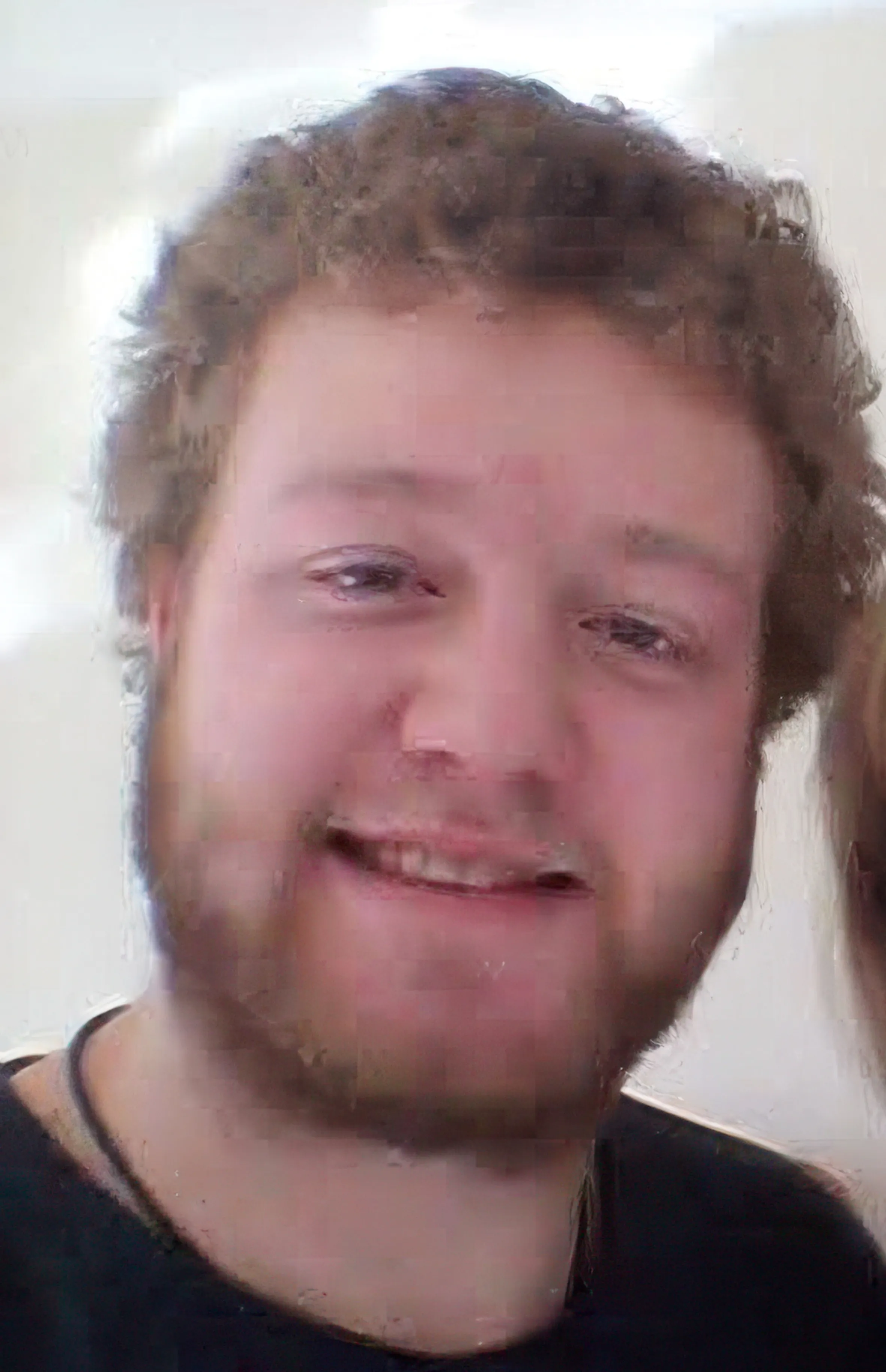 Christopher Monro, who murdered his father Peter Monro, smiling at the camera.