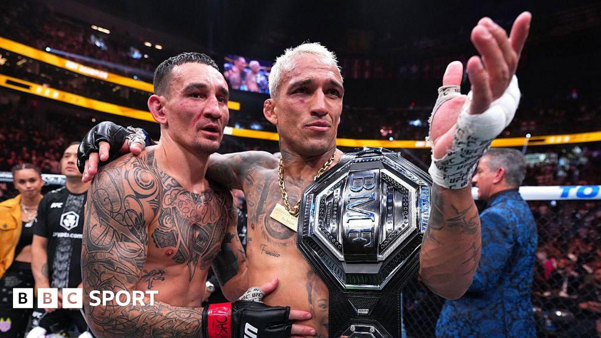 Charles Oliveira and Max Holloway after UFC 326